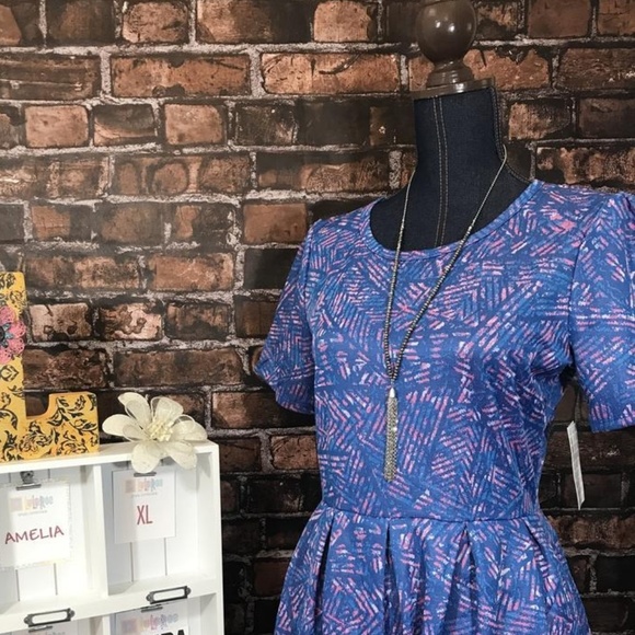 LuLaRoe Dresses & Skirts - LuLaRoe Amelia with pockets Brand new with tag